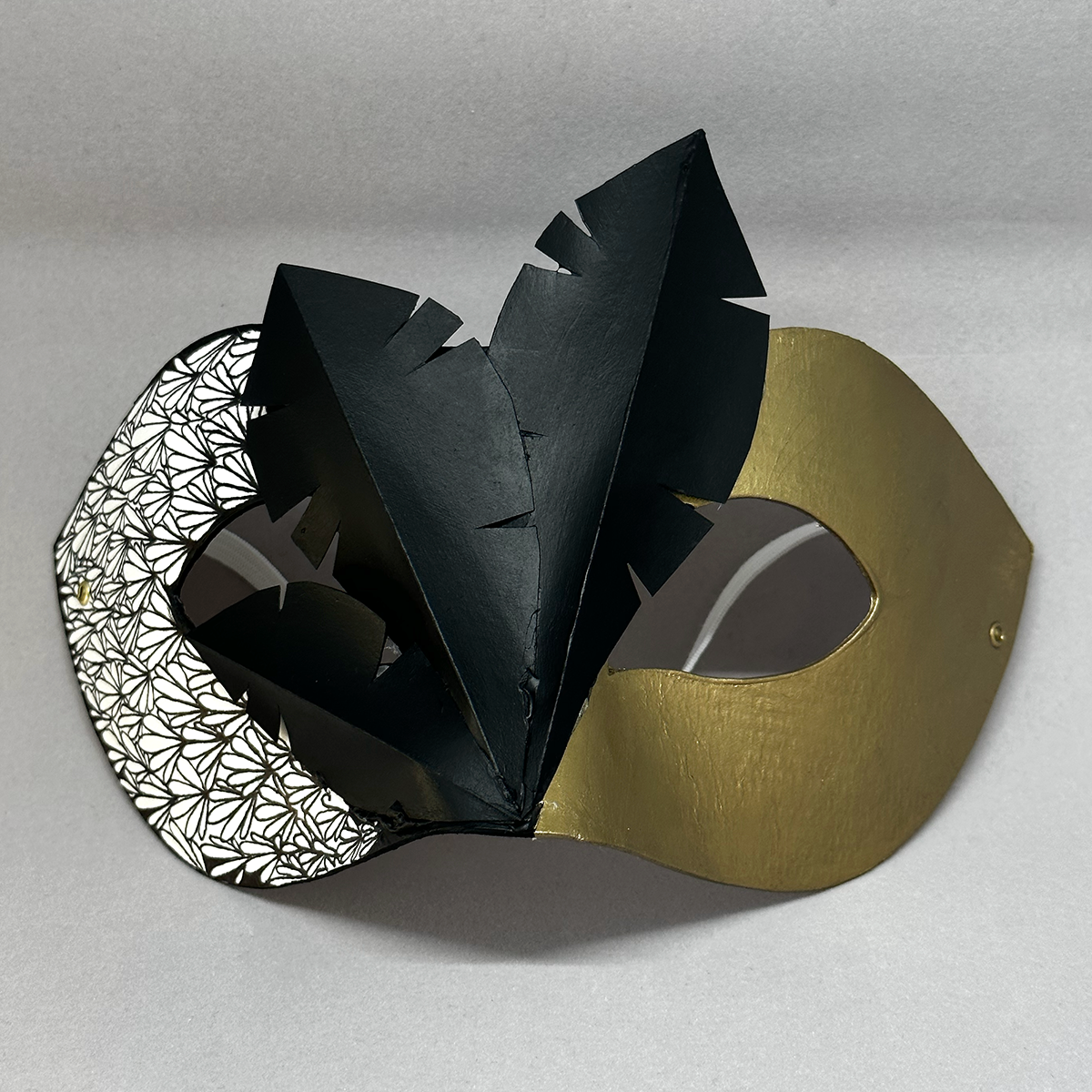 mask with feather pattern